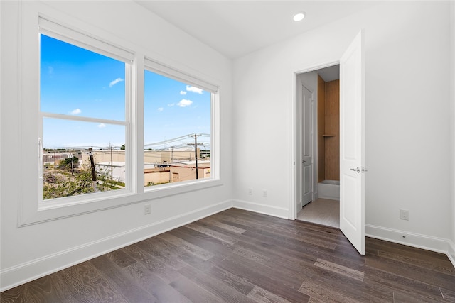 201 Carroll St, Fort Worth, TX 76107 - empty room with dark wood-style flooring and baseboards