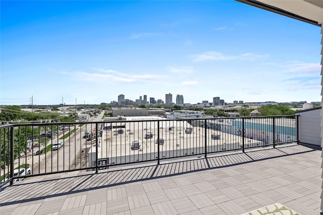 201 Carroll St, Fort Worth, TX 76107 - view of patio with a balcony and a skyline view