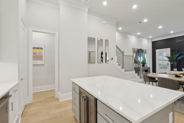 1460 N Ave, Plano, TX 75074 - kitchen with light wood-style flooring, ornamental molding, light stone countertops, wine cooler, and recessed lighting