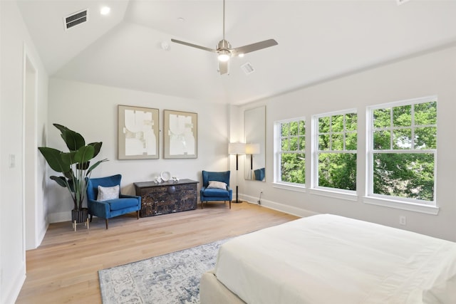 1460 N Ave, Plano, TX 75074 - bedroom with vaulted ceiling, wood finished floors, baseboards, and ceiling fan