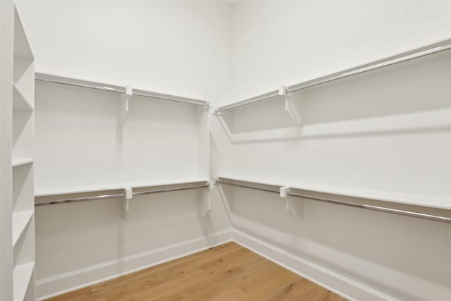 1460 N Ave, Plano, TX 75074 - spacious closet featuring wood finished floors