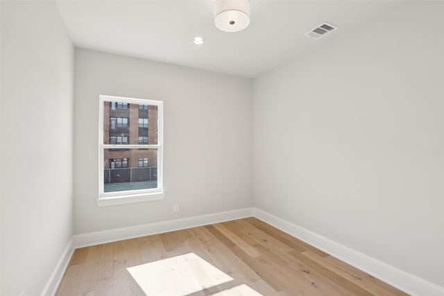 1460 N Ave, Plano, TX 75074 - spare room featuring light wood finished floors, baseboards, and recessed lighting