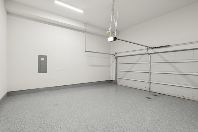 1460 N Ave, Plano, TX 75074 - garage with electric panel, a garage door opener, and baseboards