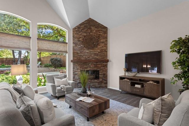 1817 Foxborough Trl, Flower Mound, TX 75028 - living room with high vaulted ceiling, carpet flooring, and a stone fireplace
