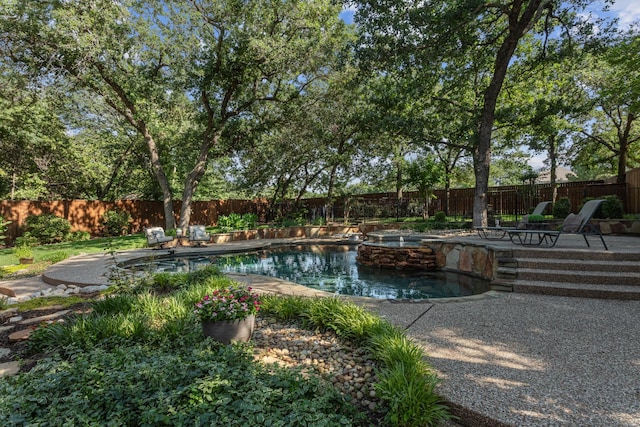 1817 Foxborough Trl, Flower Mound, TX 75028 - view of swimming pool with a fenced backyard, a patio, and a pool with connected hot tub