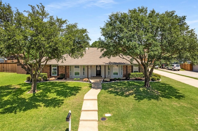 529 Doubletree Dr, Highland Village, TX 75077 - ranch-style home featuring covered porch, brick siding, a shingled roof, and concrete driveway