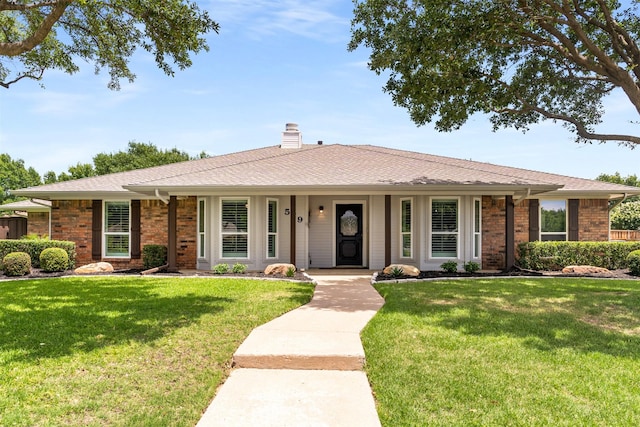 529 Doubletree Dr, Highland Village, TX 75077 - single story home featuring a chimney, a front lawn, and brick siding