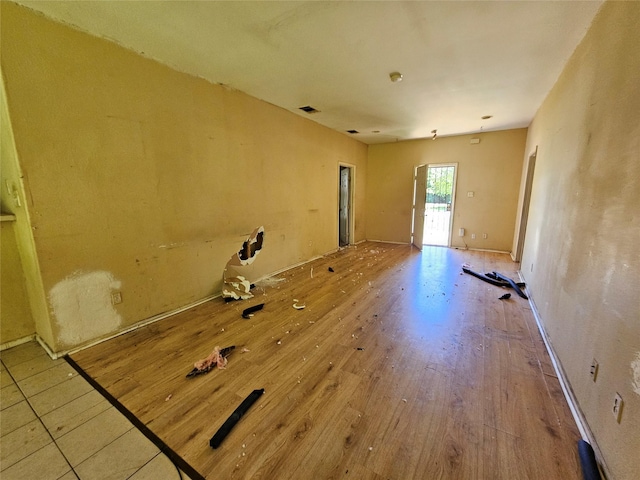 3303 Springview Ave, Dallas, TX 75216 - unfurnished room with wood finished floors