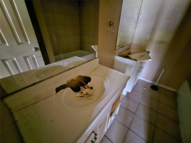 3303 Springview Ave, Dallas, TX 75216 - bathroom with tile patterned flooring, vanity, and baseboards
