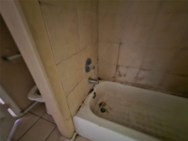 3303 Springview Ave, Dallas, TX 75216 - bathroom with tile patterned flooring and shower / washtub combination