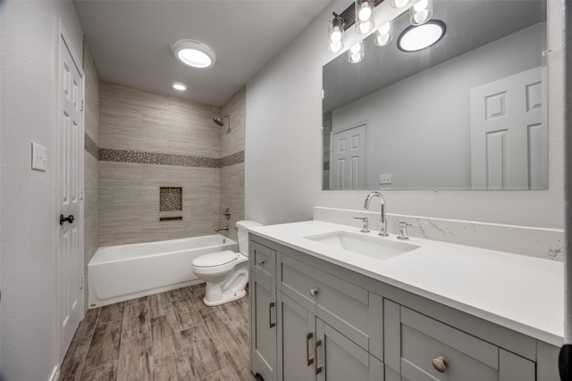505 W Thomas St, Leonard, TX 75452 - full bath with vanity, toilet, wood finished floors, and  shower combination