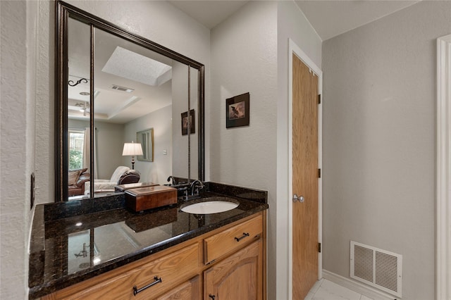 2818 Summit Ridge St, Grapevine, TX 76051 - bathroom featuring vanity and a textured wall