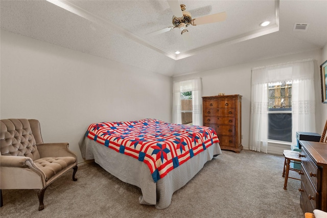 2818 Summit Ridge St, Grapevine, TX 76051 - carpeted bedroom with a ceiling fan, a tray ceiling, recessed lighting, and a textured ceiling