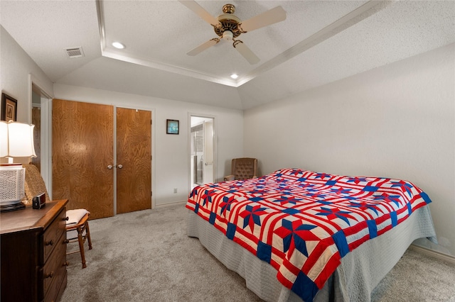 2818 Summit Ridge St, Grapevine, TX 76051 - bedroom with carpet flooring, recessed lighting, a textured ceiling, ceiling fan, and a tray ceiling