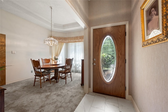 2818 Summit Ridge St, Grapevine, TX 76051 - entryway featuring ornamental molding, a chandelier, and baseboards