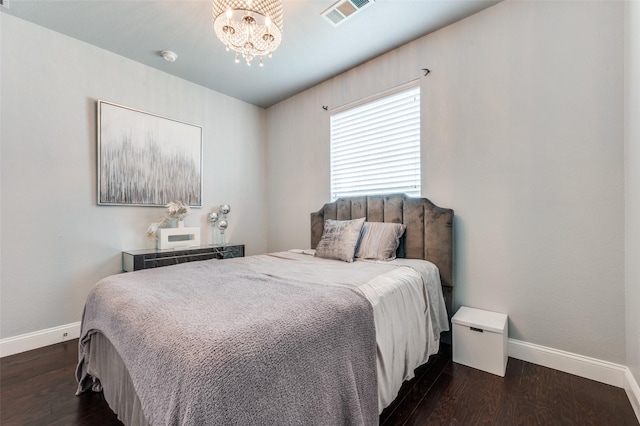 1317 Roadrunner Dr, Little Elm, TX 75068 - bedroom featuring baseboards, a chandelier, and dark wood finished floors