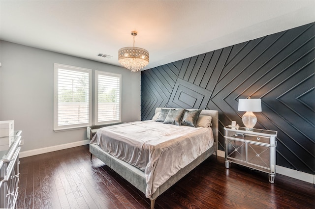 1317 Roadrunner Dr, Little Elm, TX 75068 - bedroom featuring baseboards, a chandelier, and wood-type flooring