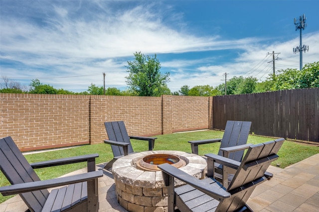 1317 Roadrunner Dr, Little Elm, TX 75068 - fenced backyard featuring an outdoor fire pit and a patio area