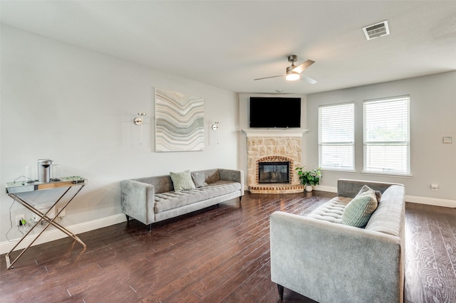 1317 Roadrunner Dr, Little Elm, TX 75068 - living room featuring ceiling fan, baseboards, wood finished floors, and a glass covered fireplace