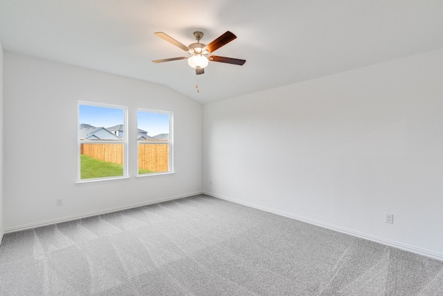1932 Coleto Rd, Crandall, TX 75114 - spare room with a ceiling fan, carpet flooring, lofted ceiling, and baseboards