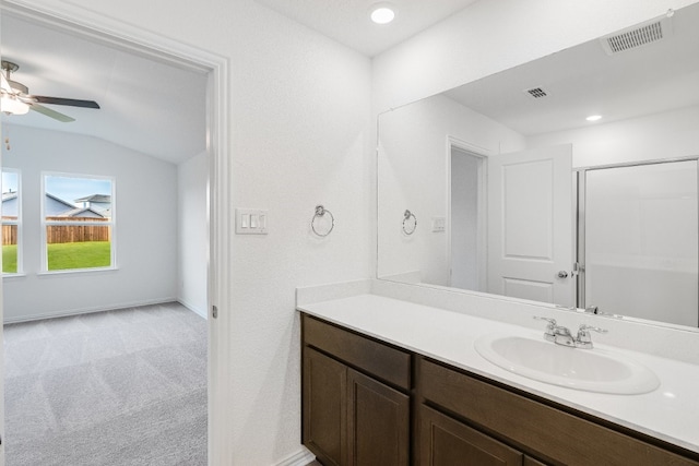 1932 Coleto Rd, Crandall, TX 75114 - full bath featuring vanity, ceiling fan, vaulted ceiling, a shower, and baseboards