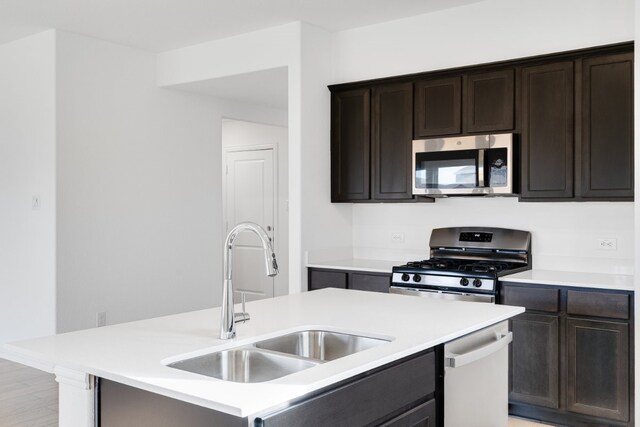 1932 Coleto Rd, Crandall, TX 75114 - kitchen featuring appliances with stainless steel finishes, a sink, and light countertops