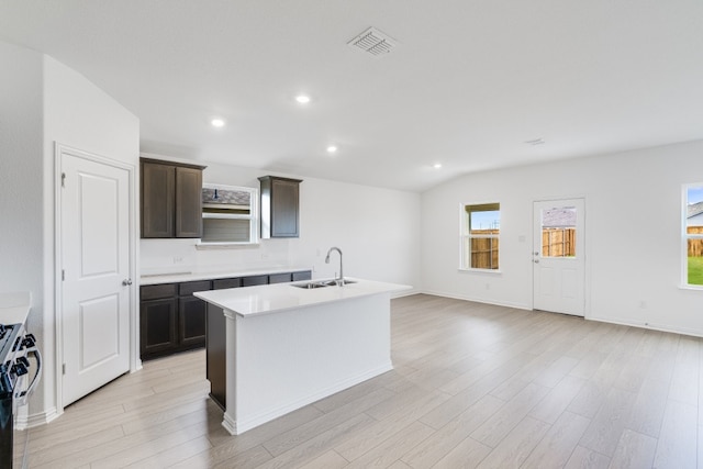 1932 Coleto Rd, Crandall, TX 75114 - kitchen featuring a sink, light wood-style floors, light countertops, an island with sink, and recessed lighting