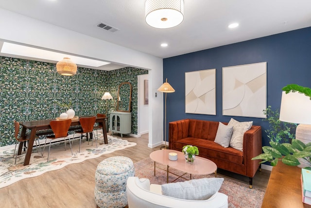 1236 Richland Oaks Dr, Richardson, TX 75081 - living area with baseboards, wallpapered walls, wood finished floors, an accent wall, and recessed lighting