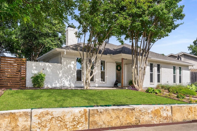 1236 Richland Oaks Dr, Richardson, TX 75081 - view of front facade with brick siding and a chimney
