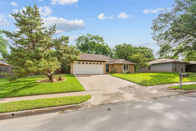 140 Amory Dr, Benbrook, TX 76126 - single story home with an attached garage, driveway, a front lawn, and brick siding