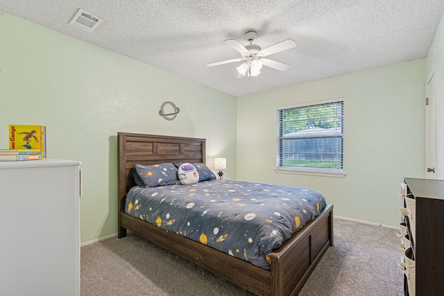 140 Amory Dr, Benbrook, TX 76126 - carpeted bedroom featuring ceiling fan, a textured ceiling, and baseboards