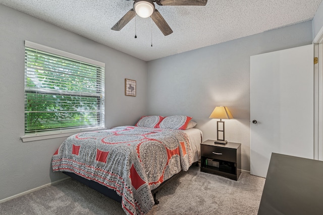 140 Amory Dr, Benbrook, TX 76126 - carpeted bedroom with ceiling fan and a textured ceiling