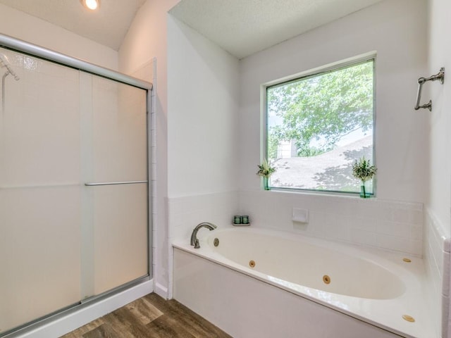 750 Pulitzer Ln, Allen, TX 75002 - full bath featuring a shower stall, a jetted tub, and wood finished floors