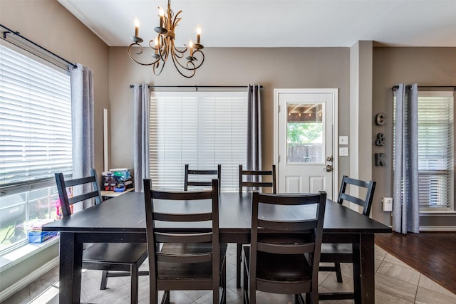 8405 White Stallion Trl, Mckinney, TX 75070 - dining space with a chandelier