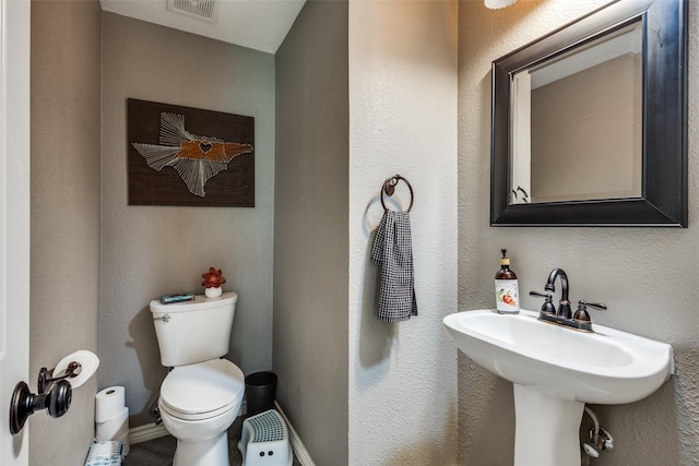 8405 White Stallion Trl, Mckinney, TX 75070 - bathroom featuring toilet and baseboards