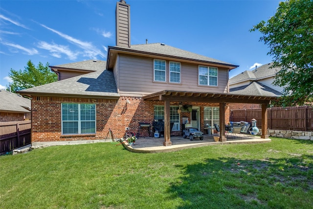 8405 White Stallion Trl, Mckinney, TX 75070 - back of house with a chimney, a patio area, brick siding, and a shingled roof