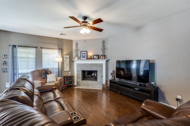 8405 White Stallion Trl, Mckinney, TX 75070 - living area with ceiling fan, wood finished floors, and a fireplace