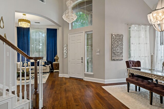 1912 White Oak Rd, Mckinney, TX 75072 - entrance foyer featuring a chandelier, wood finished floors, baseboards, stairway, and a high ceiling