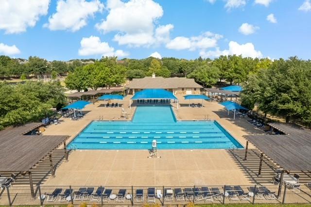 1912 White Oak Rd, Mckinney, TX 75072 - community pool featuring a patio and view of scattered trees