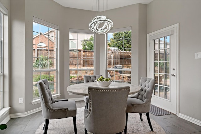 1912 White Oak Rd, Mckinney, TX 75072 - dining room featuring a chandelier, plenty of natural light, and baseboards