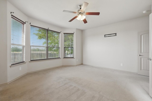 3512 Hornbeam St, Denton, TX 76226 - spare room featuring light colored carpet, ceiling fan, and a smoke detector