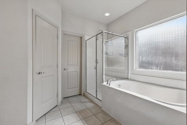 3512 Hornbeam St, Denton, TX 76226 - full bathroom featuring a shower stall, tile patterned flooring, and a garden tub