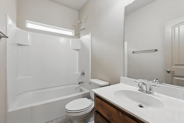 3512 Hornbeam St, Denton, TX 76226 - bathroom featuring shower / bath combination, vanity, and a textured wall