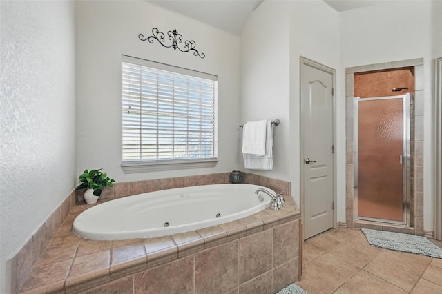 1225 County Road 1021, Burleson, TX 76028 - bathroom with a jetted tub, a stall shower, and tile patterned floors