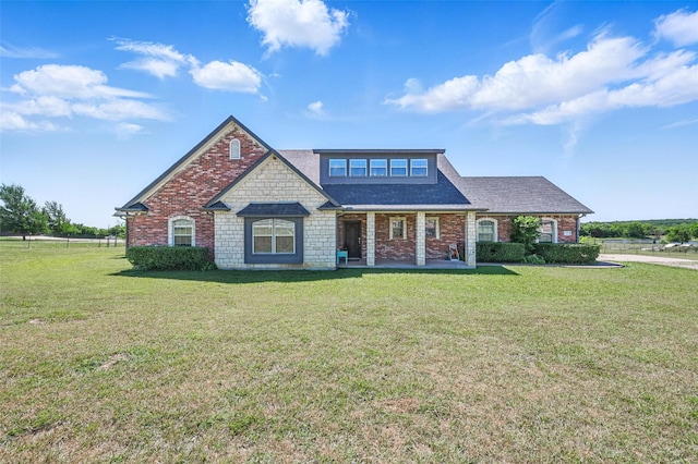 1225 County Road 1021, Burleson, TX 76028 - view of front facade with a front lawn, brick siding, covered porch, and a shingled roof