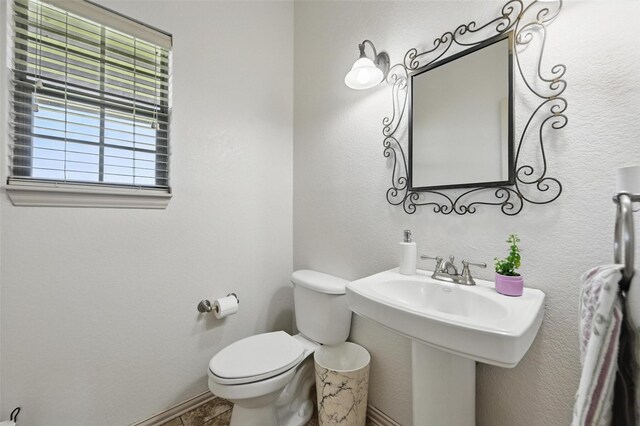 1225 County Road 1021, Burleson, TX 76028 - bathroom featuring toilet and baseboards