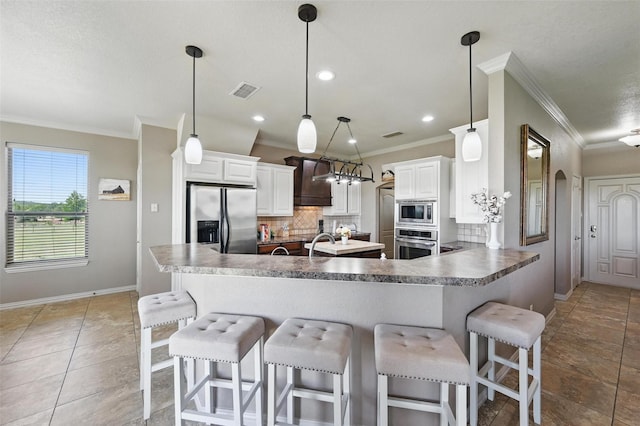 1225 County Road 1021, Burleson, TX 76028 - kitchen featuring appliances with stainless steel finishes, ornamental molding, tasteful backsplash, baseboards, and custom range hood