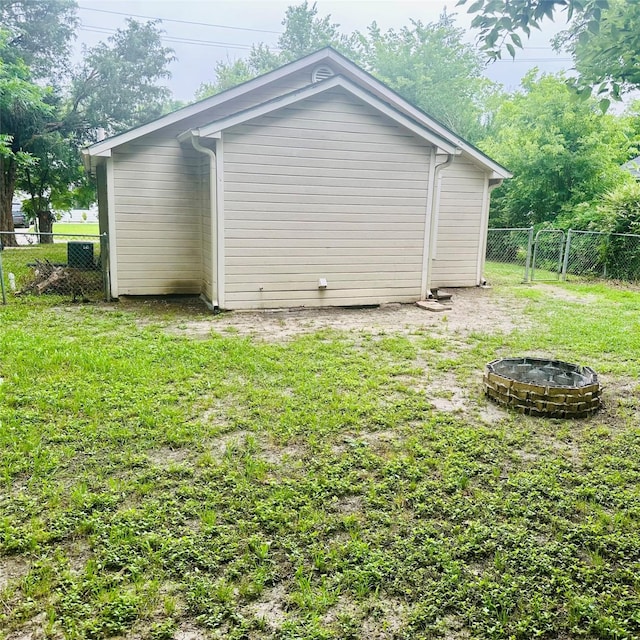 402 N Nash St, Kaufman, TX 75142 - view of home's exterior with an outdoor fire pit