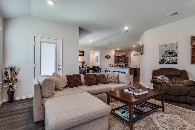 1316 Briar Hill Dr, Denton, TX 76207 - living area with dark wood-style flooring, recessed lighting, baseboards, and lofted ceiling