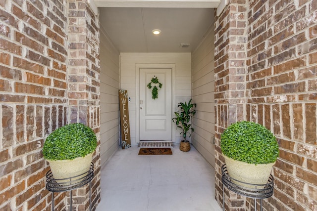 1316 Briar Hill Dr, Denton, TX 76207 - entrance to property with brick siding and a porch
